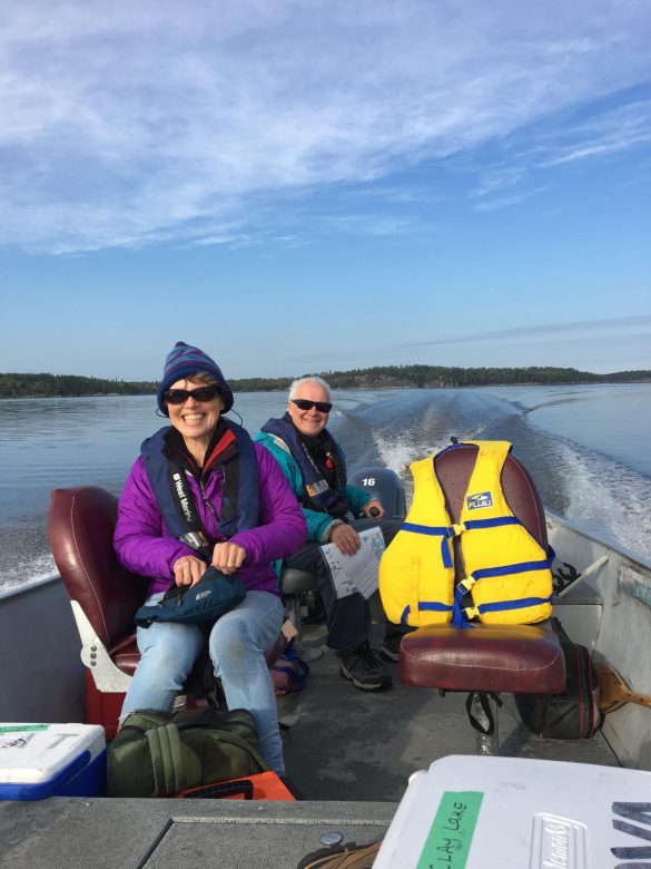 Carol Kelly and her husband John Rudd in a boat at IISD Experimental Lakes Area