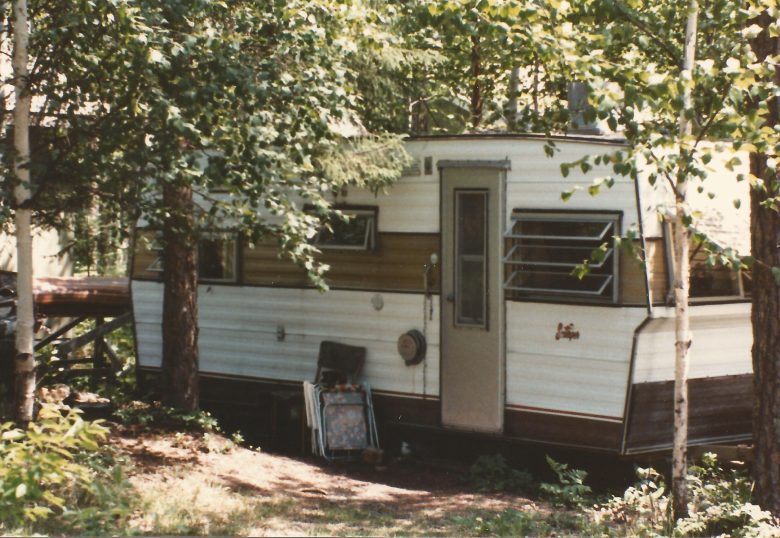 A Scamper van in some trees in the 1980s