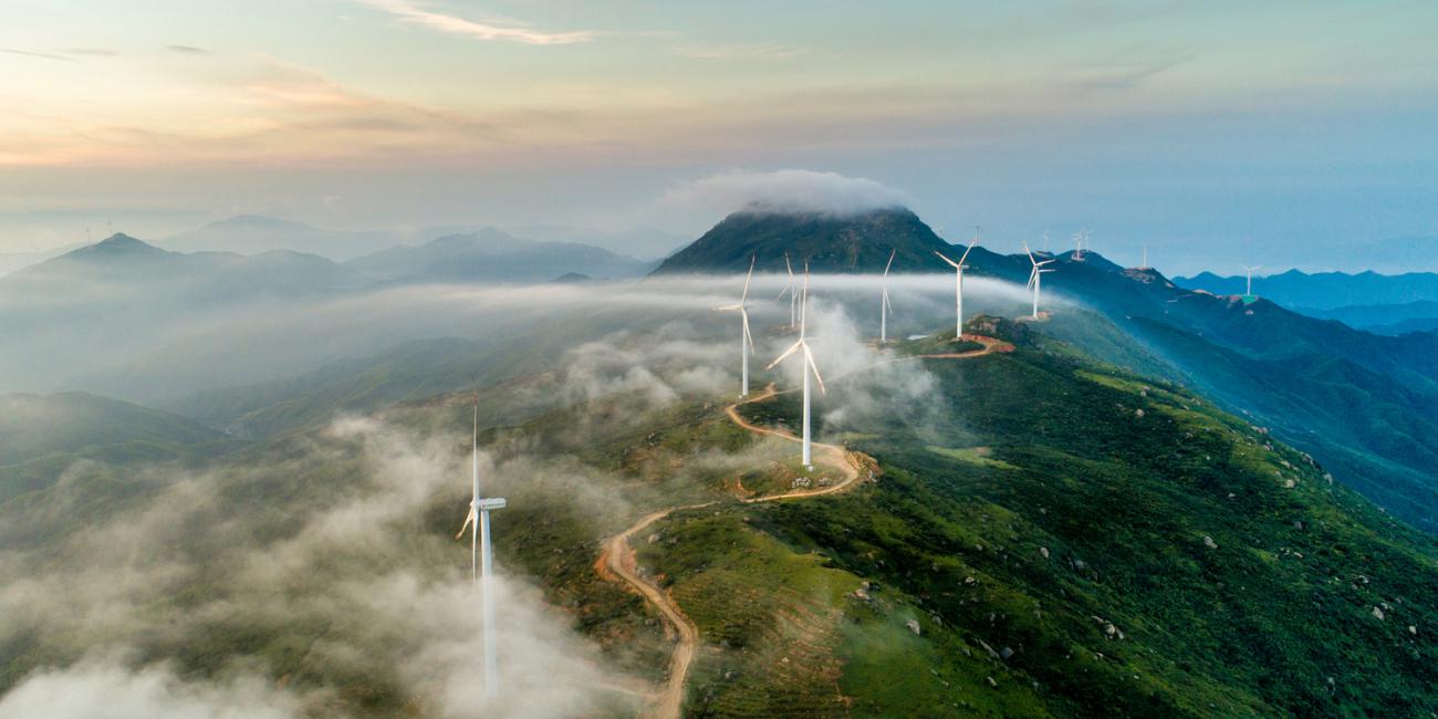 Landscape photo of mountains with windmills