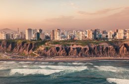 City buildings along a coastline.