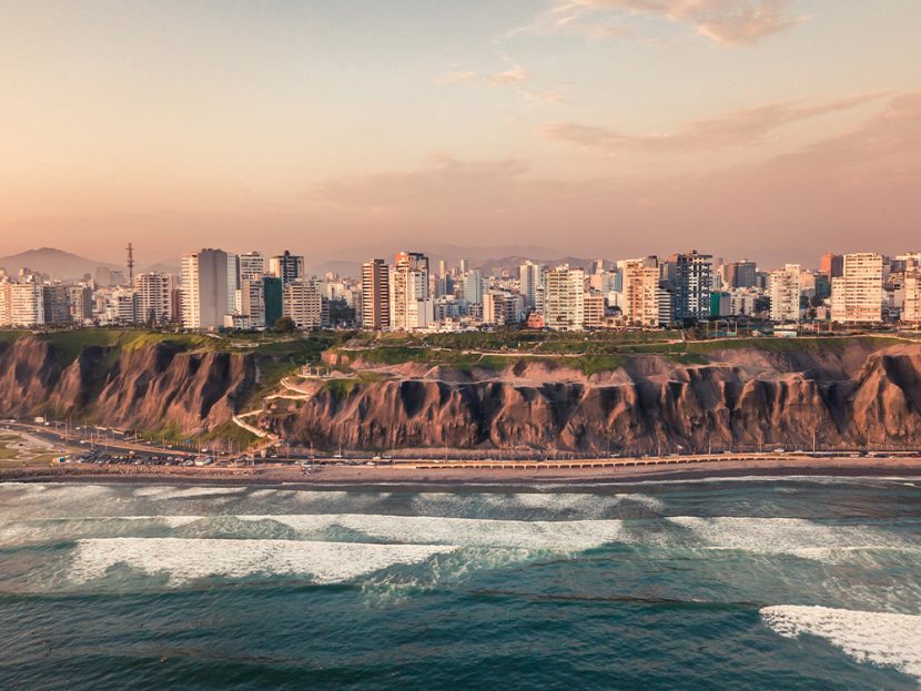 City buildings along a coastline.