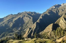 A settlement is seen amid mountains.