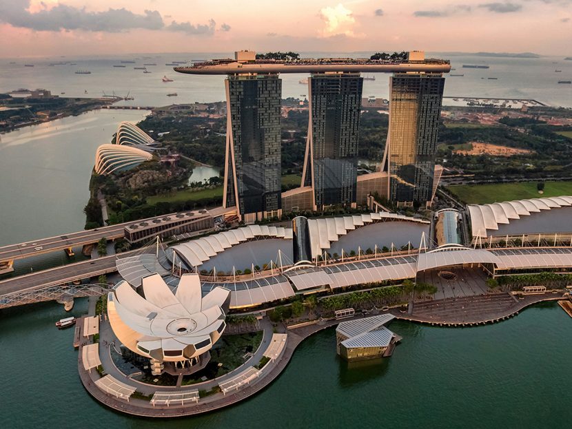 An elegantly designed resort next to water.