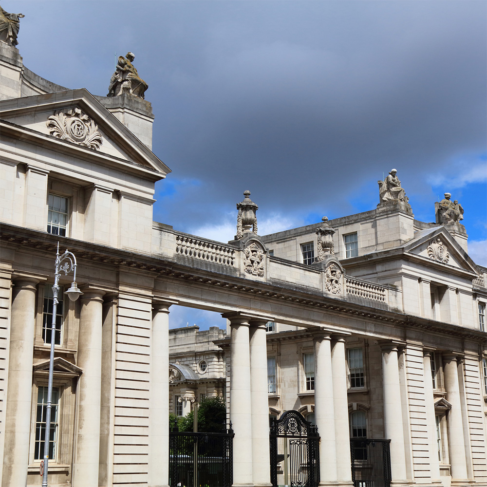 Close up of stone government building with columns.