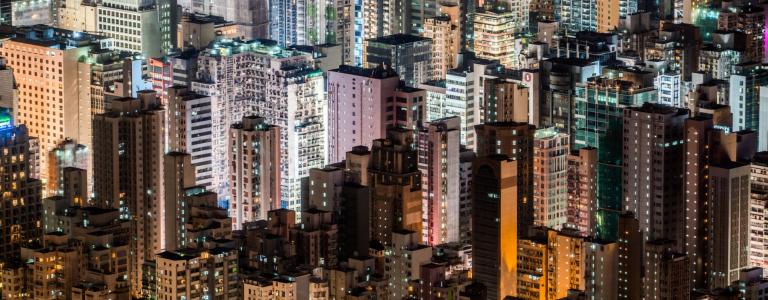 Hong Kong city skyline lit up at night