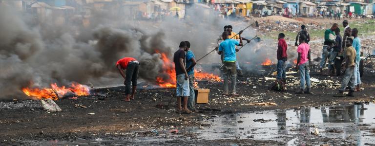 Burning waste at Agbogbloshie, Ghana