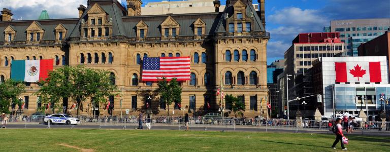 Ottawa, Canada, The Langevin Block, Three Amigos Summit, American, Canadian and Mexico flags.