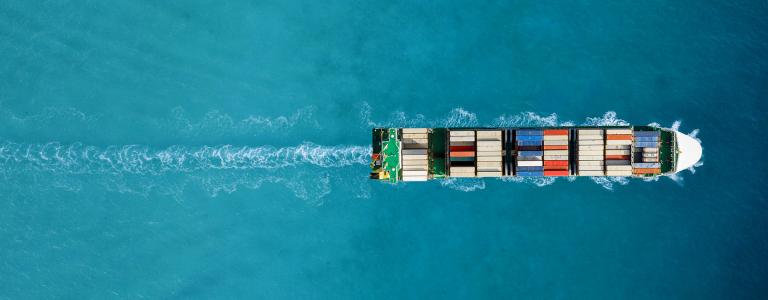 Aerial view of large container ship in the Caribbean sea.
