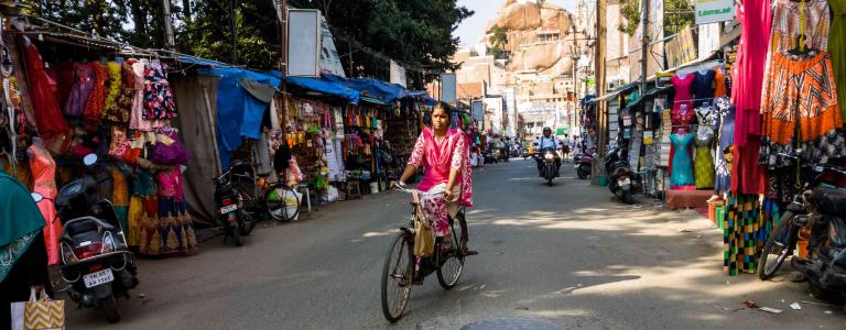 Woman cycling in Tamil Nadu