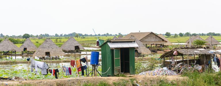 Farm built on stilts on river in Cambodia