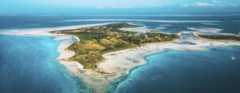 Aerial view of island and coral reefs in Fiji