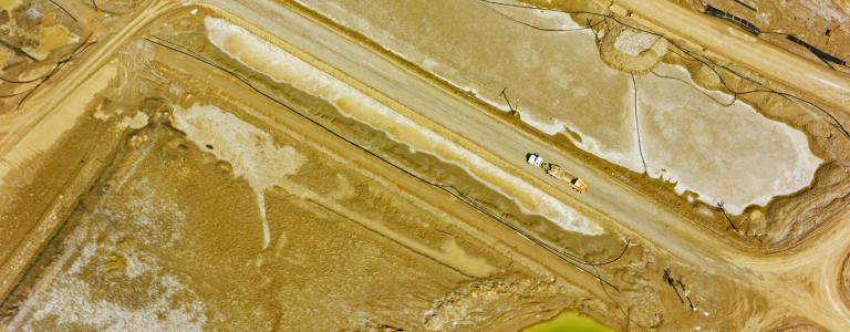 Aerial view of truck driving on road of Silver Peak Lithium Mine, Nevada, California, USA.