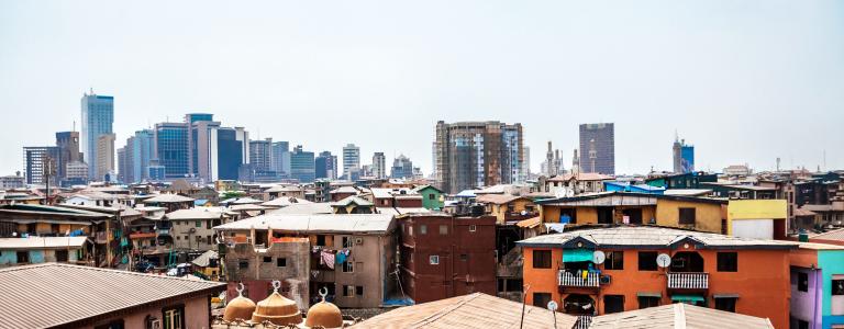 image of buildings in Lagos, high skyscrapers in the back and residential buildings in the foreground