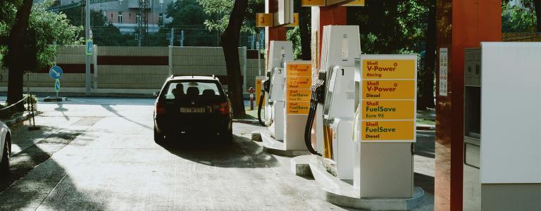 A car sits at a gas station