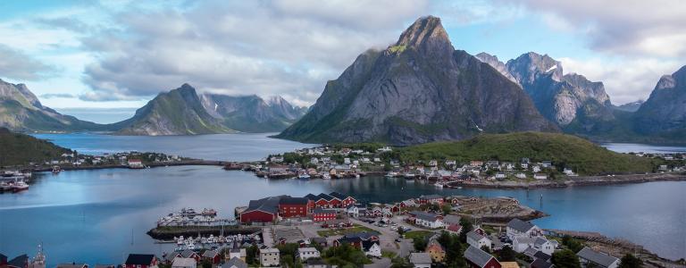Mountains rise up on Moskenes Island in Norway