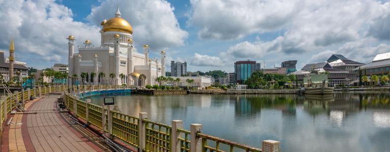 Walkway and pond surrounding the Omar Ali Saifuddien Mosque