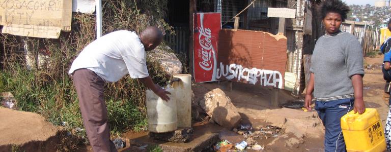 Communal_tap_(standpost)_for_drinking_water_in_Soweto,_Johannesburg,_South_Africa_(2941729790).jpg