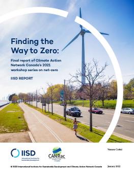 Finding the Way to Zero: Final report of Climate Action Network Canada’s 2021 workshop series on net-zero showing a Canadian neighbourhood with a large wind turbine