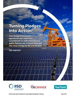 Turning Pledges Into Action cover with photo showing solar panels with an oil rig behind them