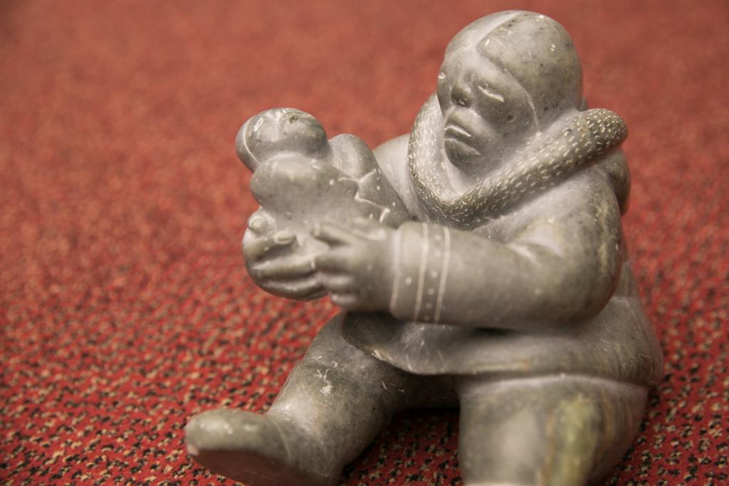 Inuit carving of a mother and child