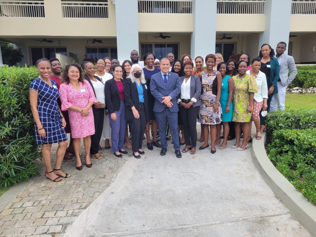 A group photograph from a National Adaptation Plan Global Network Peer Learning Summit in Jamaica in 2022