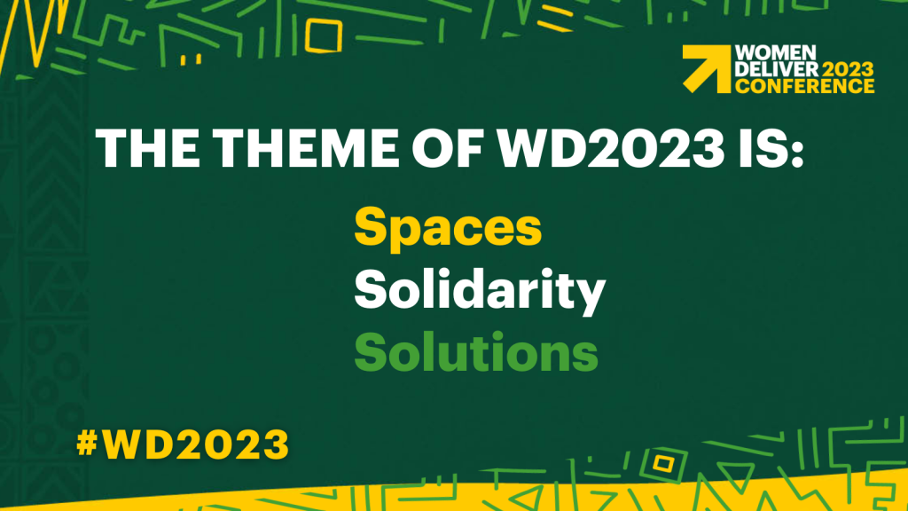 Dark green background. The text says "The theme of WD2023 is: Spaces, Solidarity, Solutions"