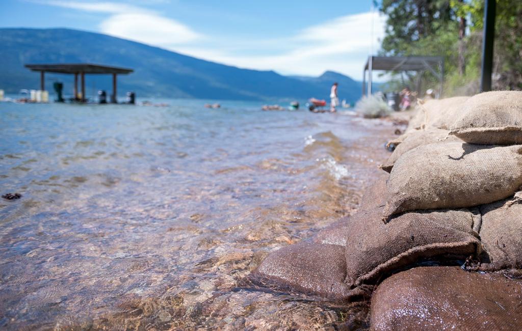 Sandbags are stacked along the shoreline of Okanagan Lake during Spring flooding on May 23, 2017 in Lake Country, British Columbia, Canada.