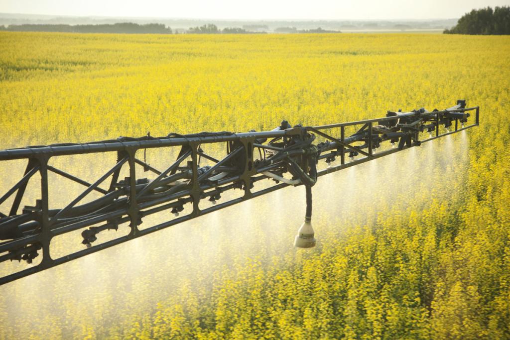 Pesticide being sprayed in a field.