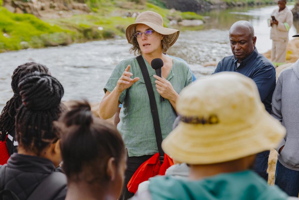 SUNCASA | Scientist and artist Hannelie Coetzee speaking to Alexandra community members during the launch of the "Art and Litter Traps" initiative in Johannesburg, South Africa.