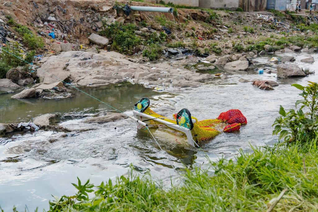 SUNCASA | Fish sculpture (litter trap) installed in the Jukskei River, Johannesburg.