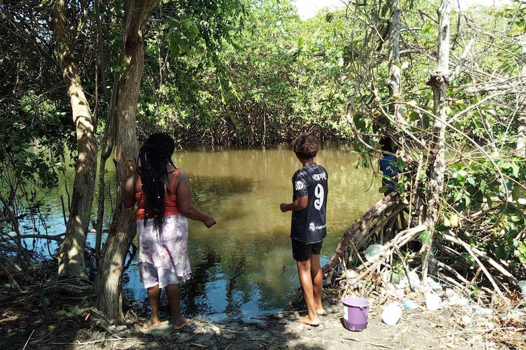 woman-boy-at-lake-fishing-belize-capa