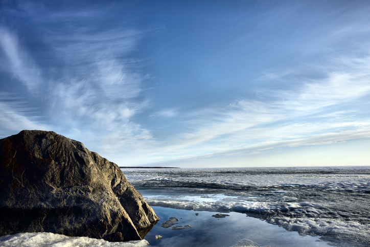 Lake Winnipeg shoreline with a boulder